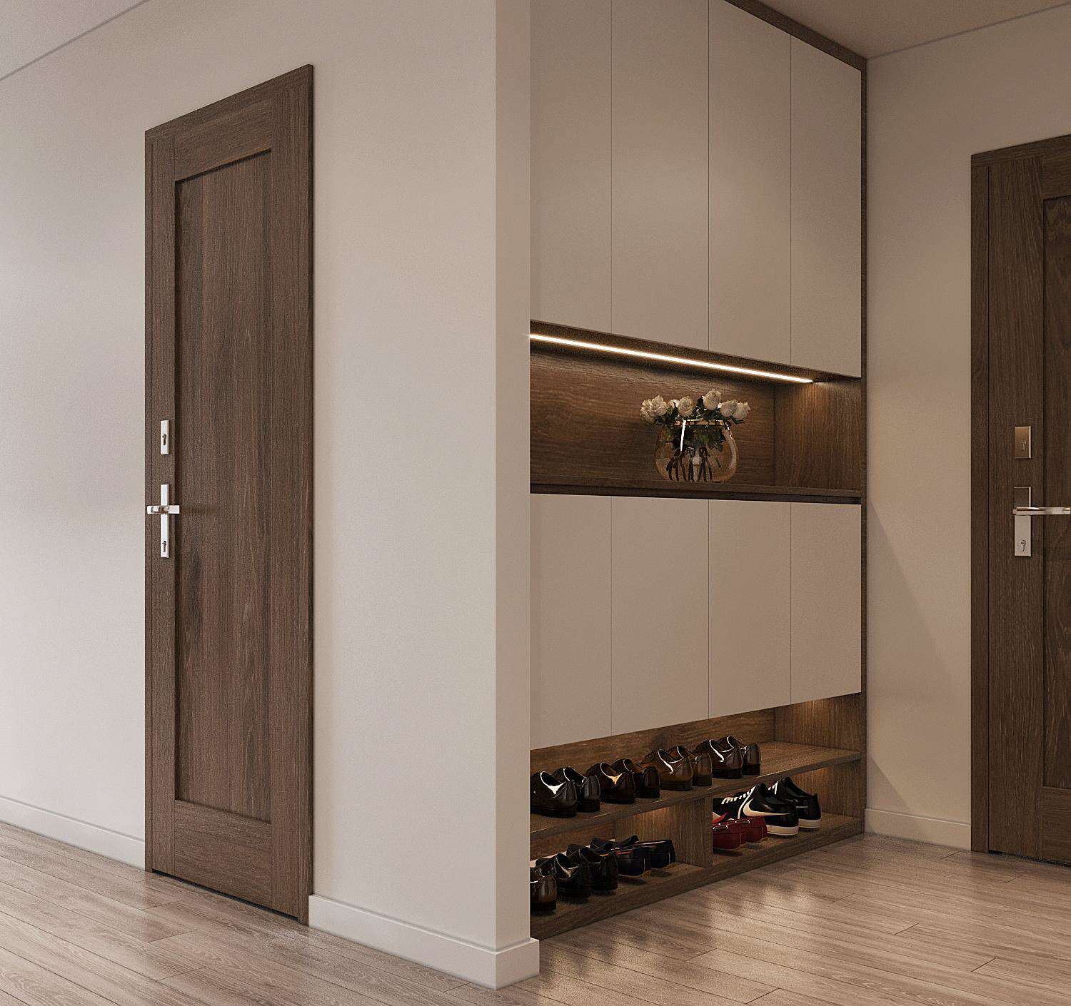 Tủ lưu trữ, kệ giày dép ở lối vào căn hộ 90m2. Với hệ tủ lưu trữ thông minh, mọi vật dụng đều được cất gọn. Căn hộ vì thế rất ngăn nắp, thoáng đãng ngay từ cửa vào.