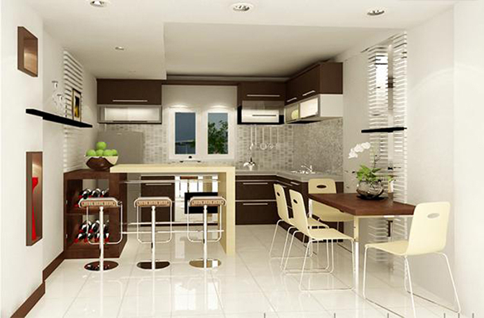 Phòng bếp đủ rộng để tích hợp không gian ăn uống gọn xinh cho gia đình 4 thành viên, cùng với đó là quầy bar mini hiện đại.