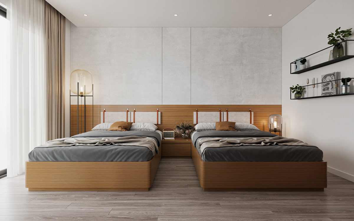 Ph&ograve;ng ngủ 2 giường đơn được trang tr&iacute; với gam m&agrave;u x&aacute;m v&agrave; n&acirc;u gỗ ấm &aacute;p. Bộ đ&ocirc;i đ&egrave;n s&agrave;n bất đối xứng về k&iacute;ch thước tạo điểm nhấn cho căn ph&ograve;ng.