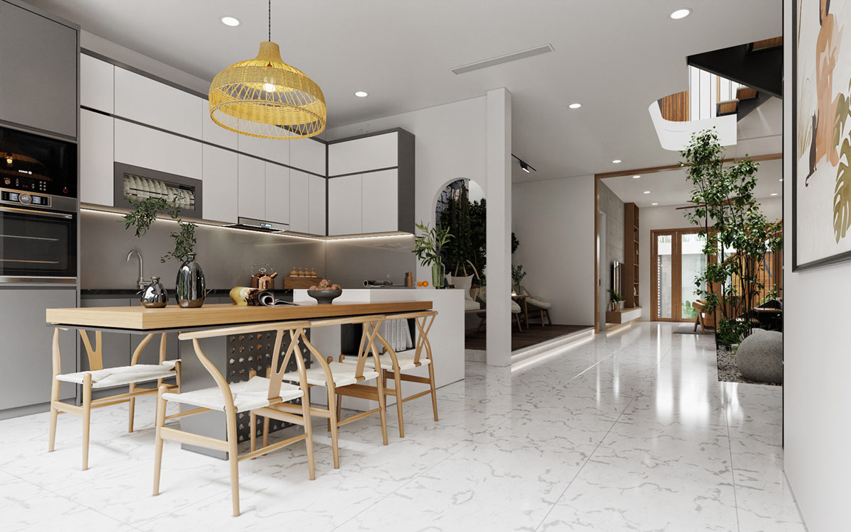 Bếp chữ L hiện đại, được thiết kế với bảng m&agrave;u x&aacute;m - trắng thanh lịch, nền n&atilde;. B&agrave;n ăn bằng gỗ d&agrave;i thoải m&aacute;i để sum họp cả gia đ&igrave;nh.