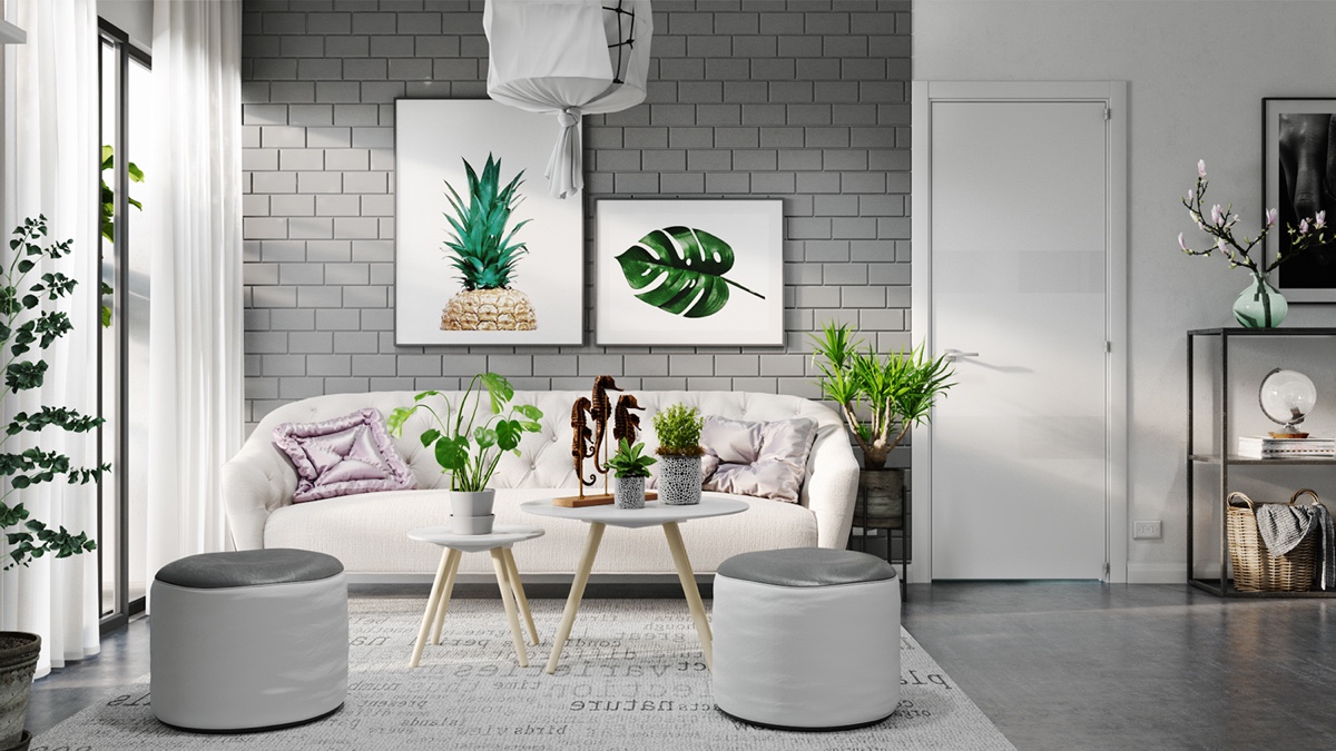Sắc x&aacute;m kết hợp xanh l&aacute; mang đến c&aacute;i nh&igrave;n mới lạ cho kh&ocirc;ng gian tiếp kh&aacute;ch. Gia chủ trang tr&iacute; tường ph&ograve;ng kh&aacute;ch bằng tranh quả dứa, l&aacute; c&acirc;y nhiệt đới, tạo điểm nhấn nổi bật tr&ecirc;n nền tường gạch mộc mạc.