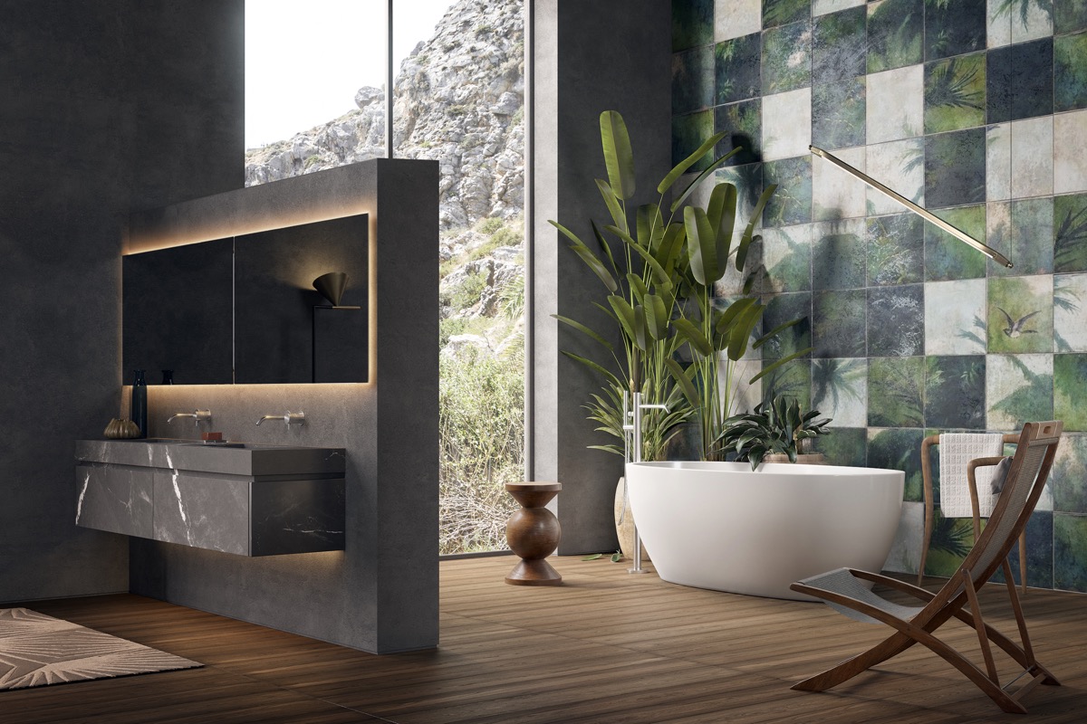 Ph&ograve;ng tắm đẹp hiện đại được l&agrave;m mờ ranh giới giữa kh&ocirc;ng gian b&ecirc;n trong v&agrave; cảnh quan thi&ecirc;n nhi&ecirc;n b&ecirc;n ngo&agrave;i. Những chậu c&acirc;y nhiệt đới xanh tốt tạo điểm nhấn h&uacute;t mắt.