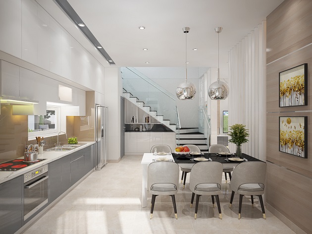 Phòng bếp kết hợp phòng ăn đủ đầy tiện ích hiện đại. Tông màu trắng chủ đạo mang lại cảm giác rộng thoáng hơn cho không gian chức năng này.