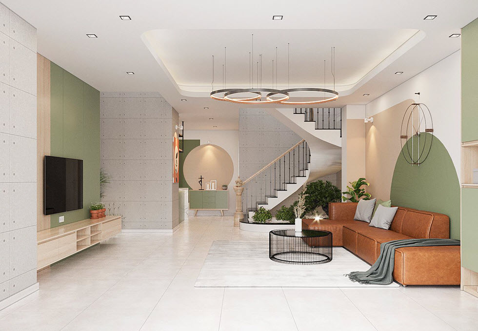 phòng khách phong cách Color Block với ghế sofa màu nâu, tường điểm nhấn màu xanh lá cây