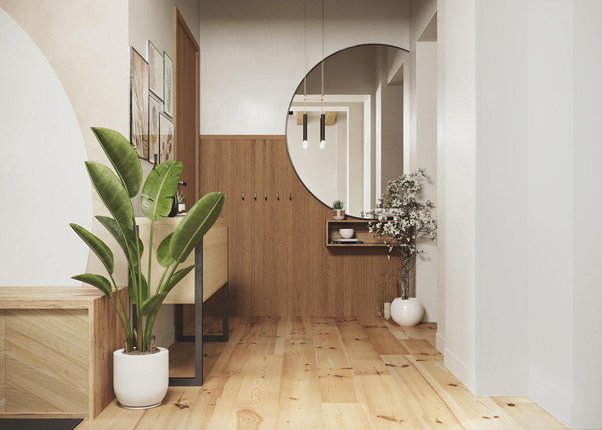 Chậu cây chuối cảnh như một khoảng đệm trực quan giữa phòng tập thể dục và lối vào nhà.