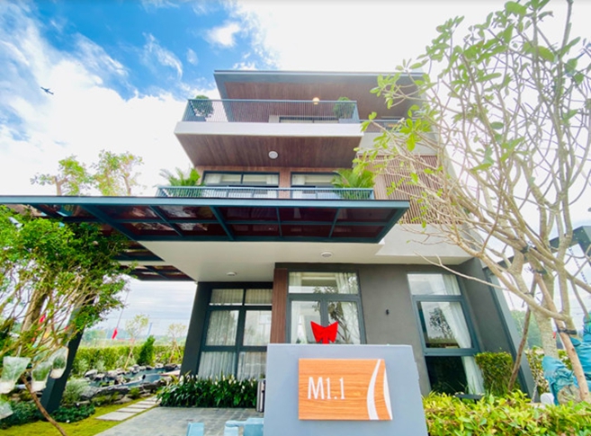 A picture containing tree, outdoor, building, houseDescription automatically generated