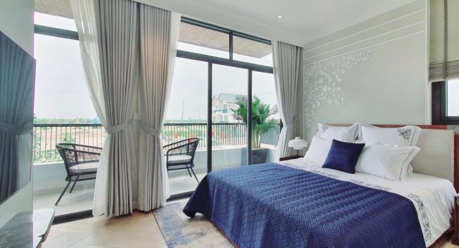 A picture containing indoor, bed, room, floorDescription automatically generated