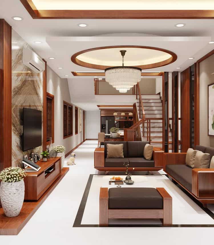 Phòng khách biệt thự kết hợp hài hòa giữa phong cách hiện đại và truyền thống với nội thất gỗ tạo cảm giác ấm áp, thân thiện.