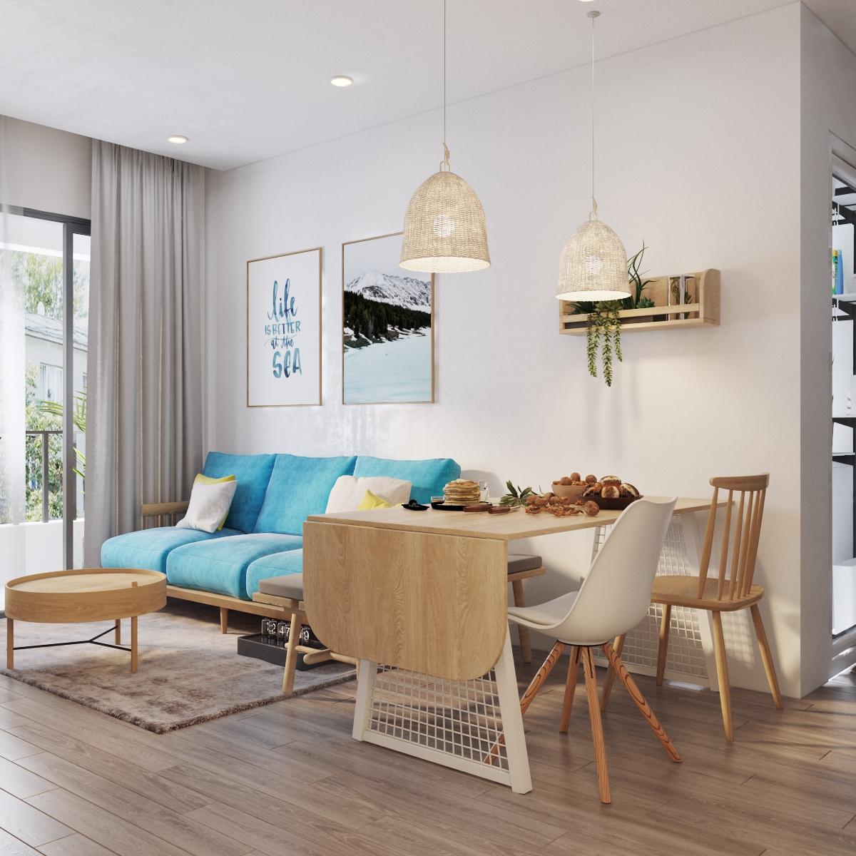 Ph&ograve;ng kh&aacute;ch được định vị bởi ghế sofa bọc đệm m&agrave;u xanh da trời nhẹ nh&agrave;ng, dịu m&aacute;t. C&ugrave;ng với đ&oacute; l&agrave; b&agrave;n tr&agrave; gỗ tr&ograve;n c&oacute; phần ch&acirc;n cao tho&aacute;ng.