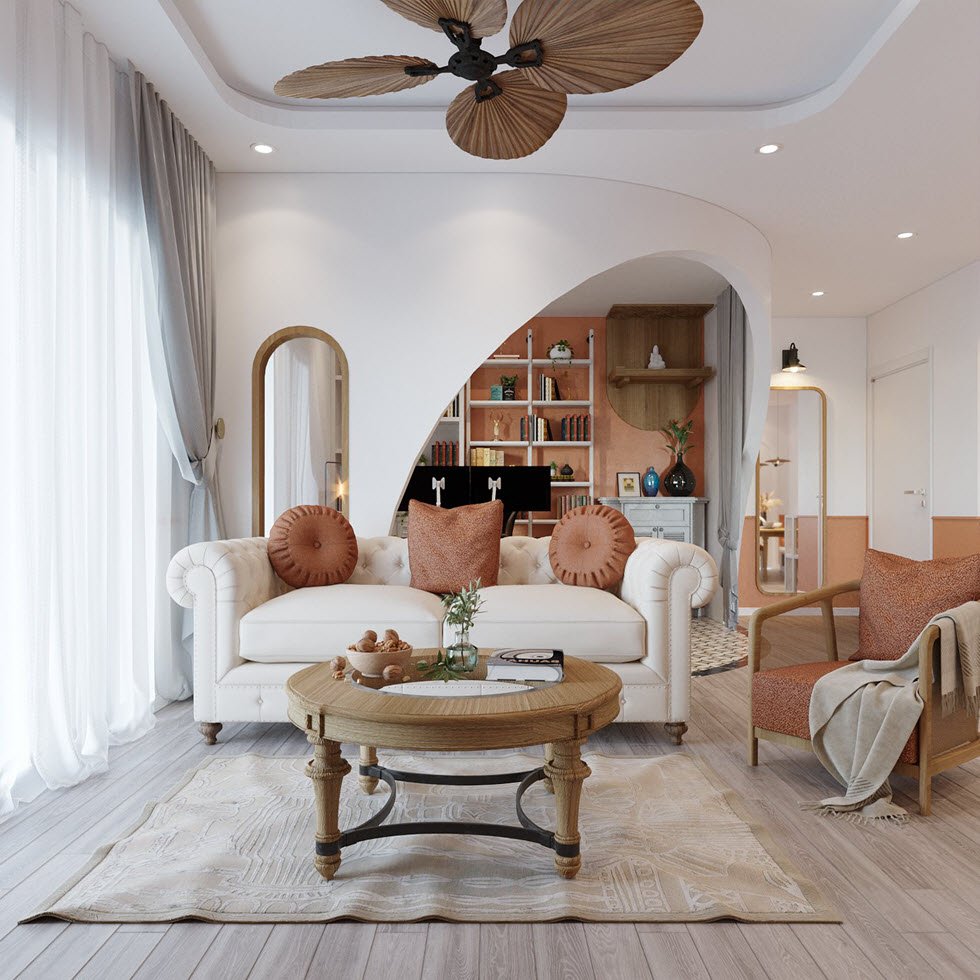 phòng khách sang trọng với sofa trắng, gối tựa màu nâu đất, rèm cửa 2 lớp, khung vòm mềm mại