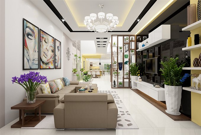 Không gian phòng khách bài trí đơn giản với điểm nhấn là bộ tranh nghệ thuật treo tường. Bàn phụ cạnh ghế sofa được tô điểm bởi lọ hoa màu tím tươi mát.