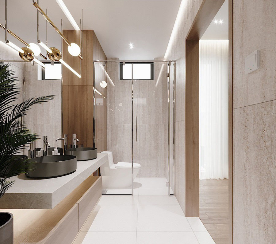 Ph&ograve;ng tắm, vệ sinh trong nh&agrave; ống 3 tầng được thiết kế với bồn rửa đ&ocirc;i v&agrave; t&aacute;ch biệt hai khu kh&ocirc; - ướt, tạo sự thuận tiện cho sinh hoạt h&agrave;ng ng&agrave;y.