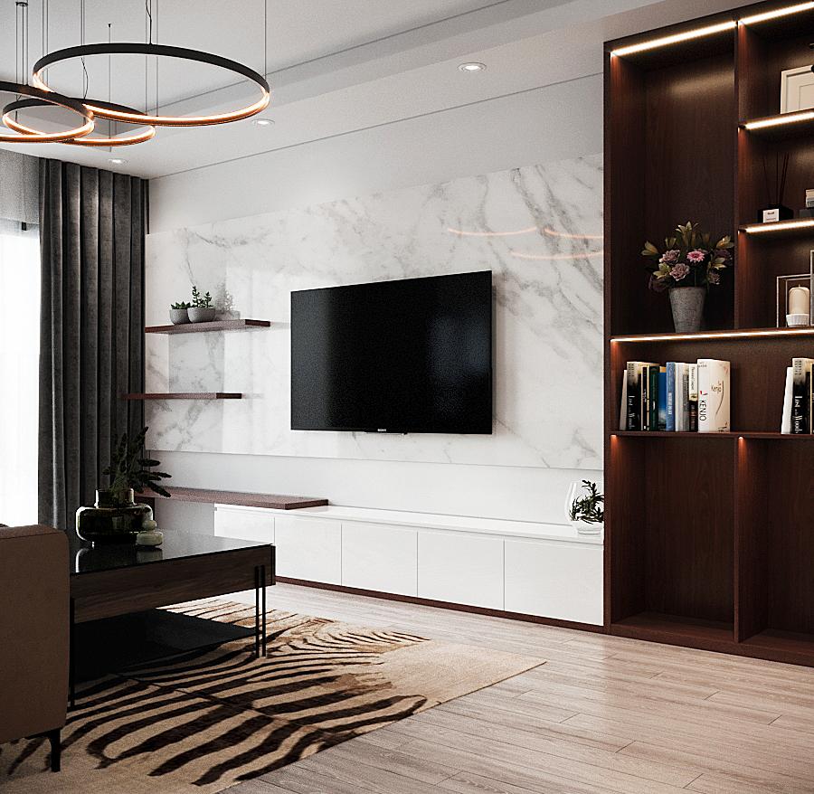 Thay vì tủ kệ cồng kềnh chiếm diện tích, tivi phòng khách được gắn trực tiếp lên tường, bổ sung thêm các kệ mở bài trí những chậu cảnh nhỏ xinh.