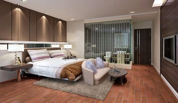 ph&ograve;ng ngủ rộng c&oacute; ghế sofa đặt ở ch&acirc;n giường, tivi treo tường