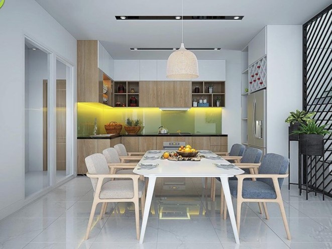 Ph&ograve;ng bếp kết hợp ph&ograve;ng ăn rộng tho&aacute;ng, ấm c&uacute;ng với điểm nhấn l&agrave; tường ốp bếp t&ocirc;ng m&agrave;u xanh l&aacute; nhẹ nh&agrave;ng. B&agrave;n ghế ăn phong c&aacute;ch Bắc &Acirc;u hiện đại, tinh tế.
