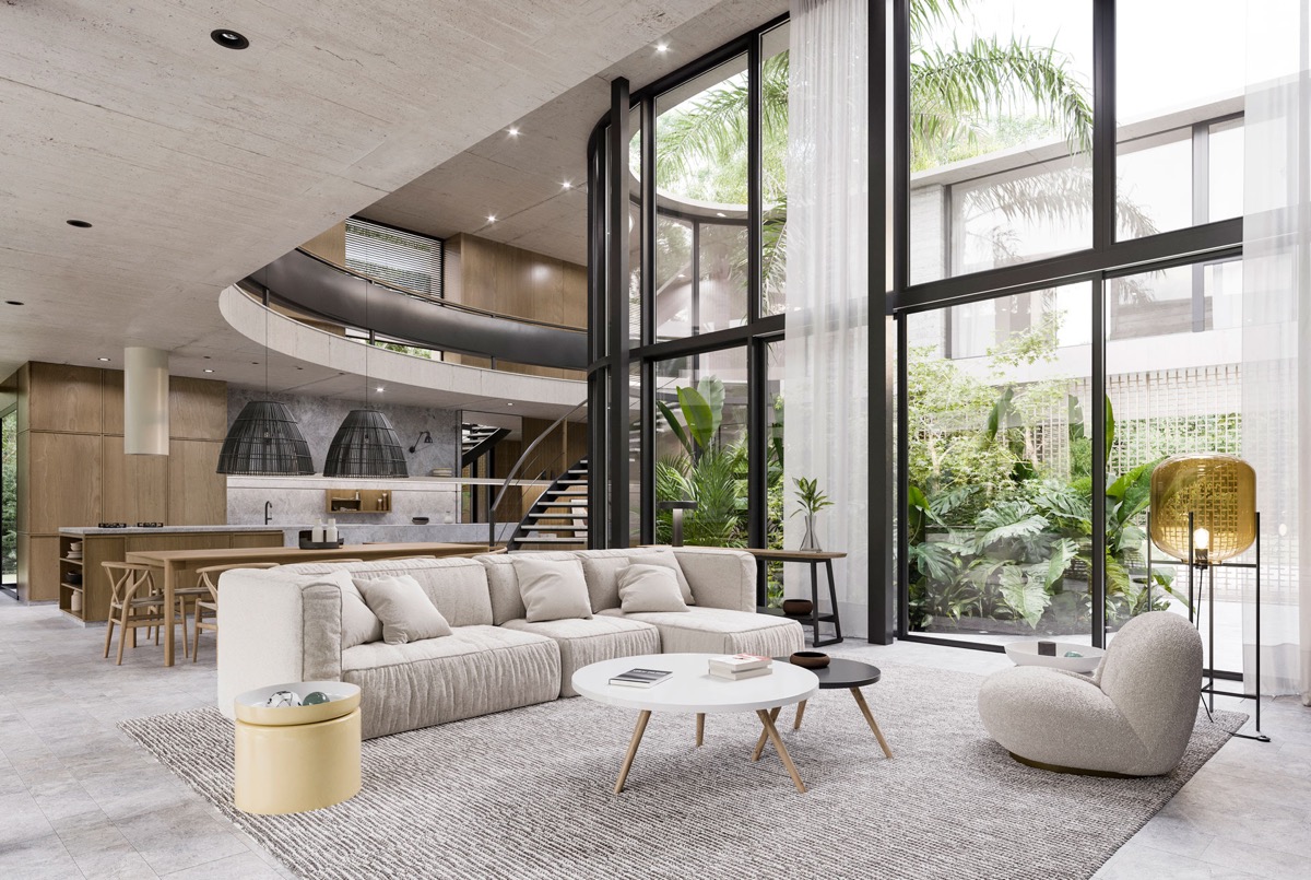 Tường k&iacute;nh trong suốt cho ph&eacute;p ph&ograve;ng kh&aacute;ch như kết nối trực tiếp với cảnh quanh thi&ecirc;n nhi&ecirc;n b&ecirc;n ngo&agrave;i nh&agrave;.