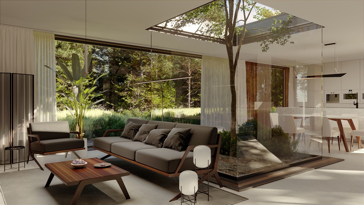 C&acirc;y xanh lớn mọc xuy&ecirc;n giếng trời tạo sự kết nối h&agrave;i h&ograve;a với cảnh quan thi&ecirc;n nhi&ecirc;n b&ecirc;n ngo&agrave;i. C&acirc;y xanh cũng tạo sự ph&acirc;n t&aacute;ch giữa ph&ograve;ng kh&aacute;ch v&agrave; ph&ograve;ng ăn b&ecirc;n trong.