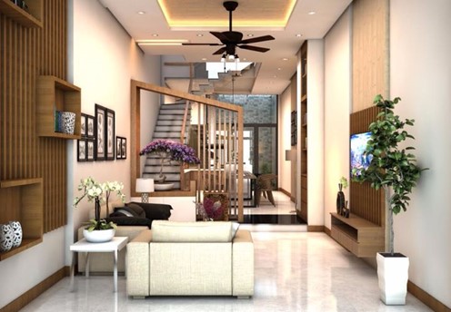 Ph&ograve;ng kh&aacute;ch nh&agrave; ống nằm ngay sau cửa ch&iacute;nh v&agrave;o nh&agrave; với thiết kế nội thất hiện đại, t&ocirc;ng m&agrave;u trung t&iacute;nh sang trọng.
