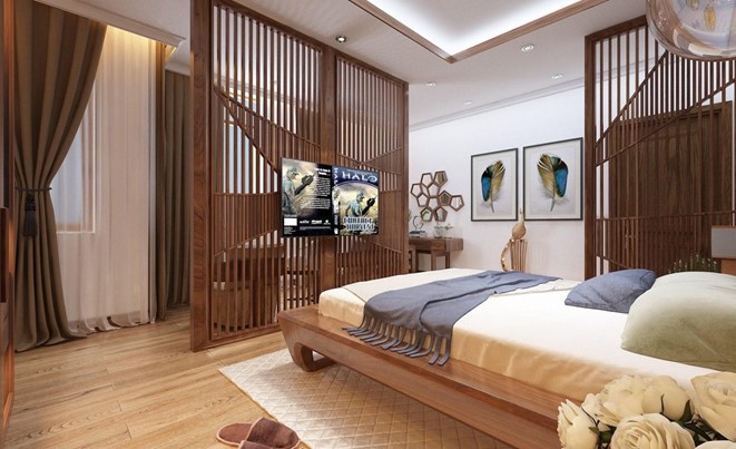 Ph&ograve;ng ngủ master kh&aacute; rộng r&atilde;i, c&oacute; th&ecirc;m g&oacute;c l&agrave;m việc tại nh&agrave; được ph&acirc;n t&aacute;ch với khu nghỉ ngơi bằng lam gỗ th&ocirc;ng tho&aacute;ng.