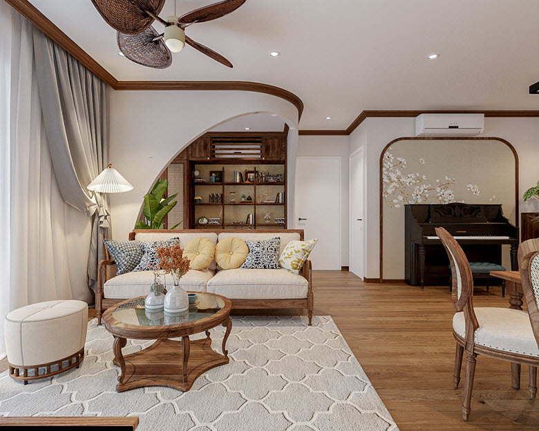 To&agrave;n cảnh ph&ograve;ng kh&aacute;ch v&agrave; ph&ograve;ng đọc s&aacute;ch thư gi&atilde;n trong căn hộ 60m2 với chi tiết cong v&ograve;m ấn tượng