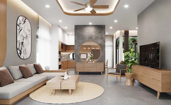 Ph&ograve;ng kh&aacute;ch mẫu nh&agrave; biệt thự 1 tầng m&aacute;i Th&aacute;i đẹp to&aacute;t l&ecirc;n vẻ sang trọng, thanh lịch với nội thất phong c&aacute;ch hiện đại, t&ocirc;ng m&agrave;u trắng, ghi x&aacute;m nhẹ nh&agrave;ng. V&aacute;ch lam c&aacute;ch điệu tinh tế tạo sự ph&acirc;n t&aacute;ch tương đối với khu bếp nấu b&ecirc;n trong.