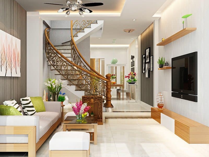 Ph&ograve;ng kh&aacute;ch mẫu nh&agrave; ống 2 tầng đẹp c&oacute; thiết kế hiện đại tối giản nhằm tạo độ tho&aacute;ng cho tổng thể kh&ocirc;ng gian sinh hoạt chung.