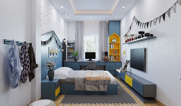Ph&ograve;ng ngủ cho con trai &uacute;t với bảng m&agrave;u xanh dương trẻ trung, năng động. G&oacute;c học tập đặt cạnh cửa sổ để tận dụng &aacute;nh s&aacute;ng tự nhi&ecirc;n.