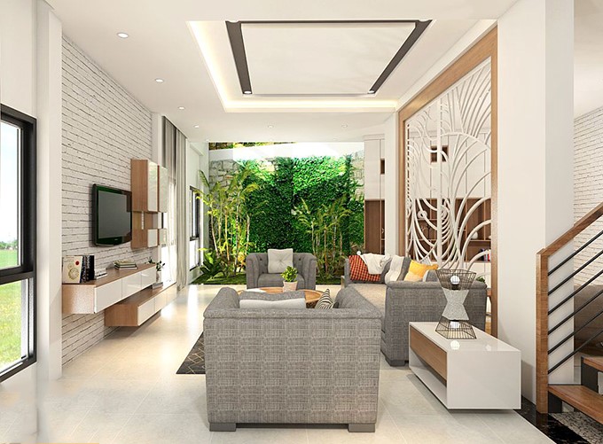 Ph&ograve;ng kh&aacute;ch mẫu nh&agrave; ống 4,5 tầng với tầm nh&igrave;n tho&aacute;ng đ&atilde;ng, hướng ra mảng xanh tươi m&aacute;t ph&iacute;a trước nh&agrave;. V&aacute;ch lam c&aacute;ch điệu tạo điểm nhấn ấn tượng.