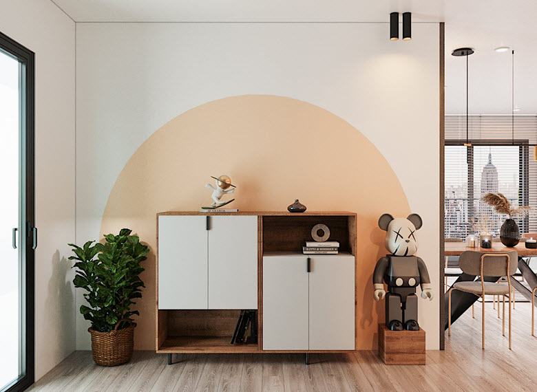 G&oacute;c decor xinh y&ecirc;u trong căn hộ 2 ph&ograve;ng ngủ với tủ kệ thiết kế cửa sole lạ mắt, chậu c&acirc;y xanh tốt tạo điểm nhấn.