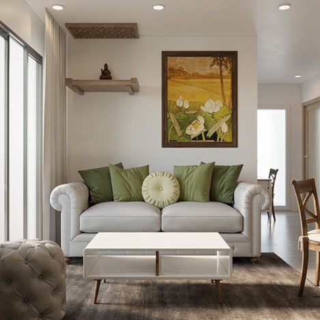 Bức chân vào phòng khách bạn cảm nhận được sự nhẹ nhàng, thư thái của không gian mang chút đồng quê bình yên với hương sen, lúa chín. Ghế sofa chắc chắn, mang hơi hướng Indochine, đặt vừa vặn trong phong khách nhỏ xinh này.