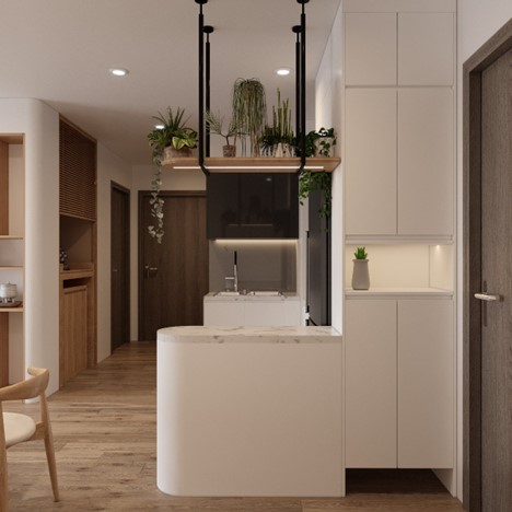 Lối vào căn hộ với tủ giày nhỏ xinh yêu, kết hợp cùng bàn đảo, vừa là nơi chế biến thức ăn, vừa giúp ngăn cách không gian. Một ý tưởng khá tinh tế đến từ kiến trúc sư.