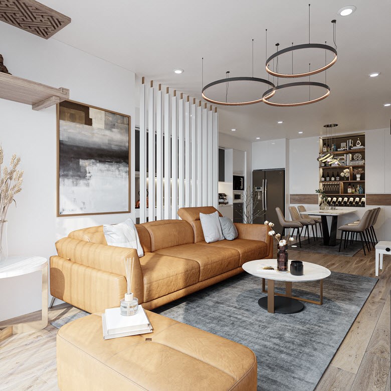 Ph&ograve;ng kh&aacute;ch ấn tượng với bộ sofa da nổi bật trong kh&ocirc;ng gian thanh lịch n&agrave;y. Hệ lam d&agrave;i kịch trần vừa gi&uacute;p t&aacute;ch biệt kh&ocirc;ng gian ph&ograve;ng kh&aacute;ch với ph&ograve;ng bếp, vừa l&agrave; điểm nhấn trang tr&iacute; v&ocirc; c&ugrave;ng tinh tế.  