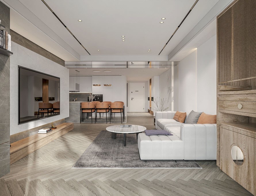Ngay bên cạnh là hệ thống bàn trà, sofa nỉ màu xám trắng cao cấp đồng điệu với tông màu của căn nhà. Vách tivi được gắn nổi, có thêm hệ thống đèn LED âm làm cho không gian thêm phần ấn tượng mỗi buổi tối.