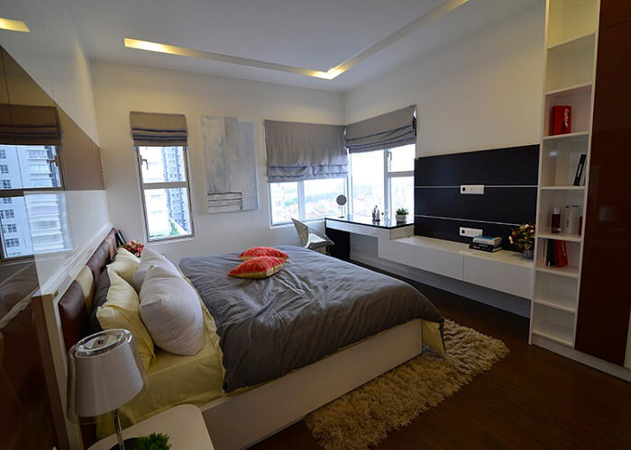 phòng ngủ căn h&ocirc;̣ m&acirc;̃u Sunrise City