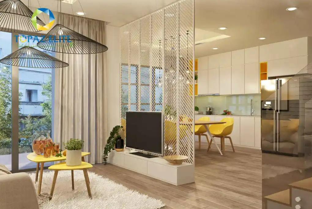 Vách ngăn tinh tế phân tách giữa phòng khách và khu bếp - phòng ăn bên trong.