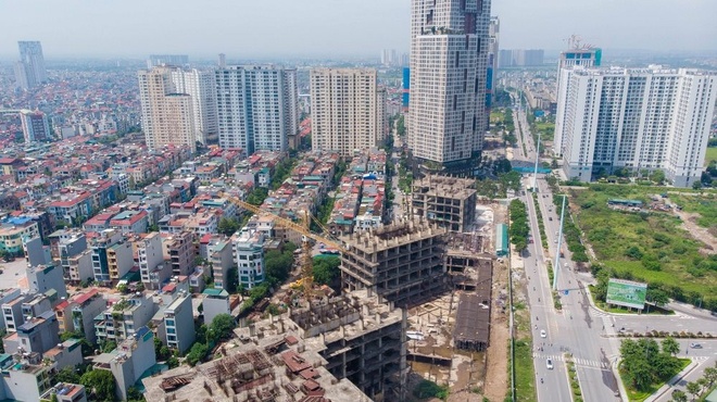 một góc thành phố nhìn từ trên cao với nhiều dự án chung cư cao tầng, nhà phố