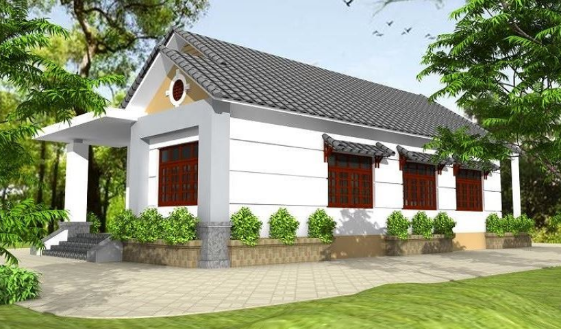 Mẫu nhà cấp 4 sân vườn với tường sơn trắng nổi bật trên nền cảnh quan xanh mướt. Mái ngói xám cùng tông với mái che cửa sổ tạo sự thống nhất, đồng điệu cho ngoại thất nhà.