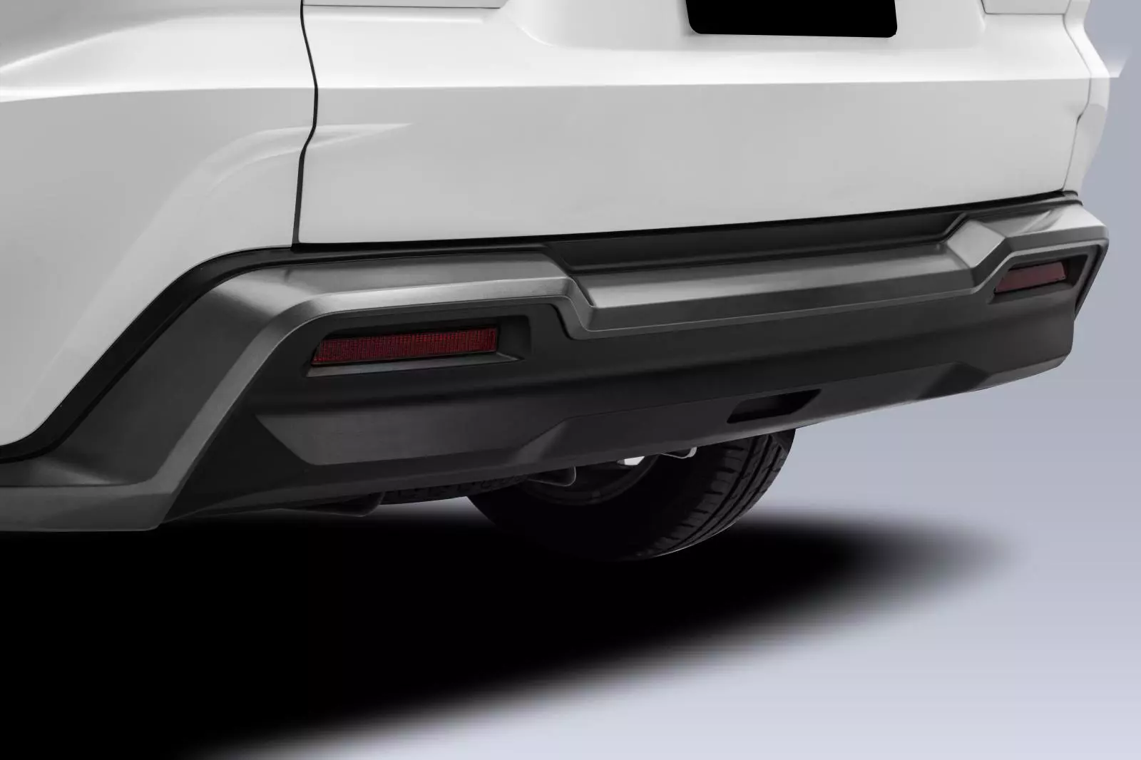 Cản sau tinh chỉnh với c&aacute;c đường g&acirc;n dập nổi liền mạch.