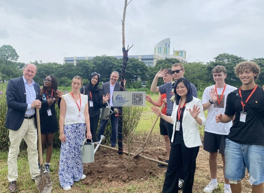 A group of people standing in a field  AI-generated content may be incorrect.