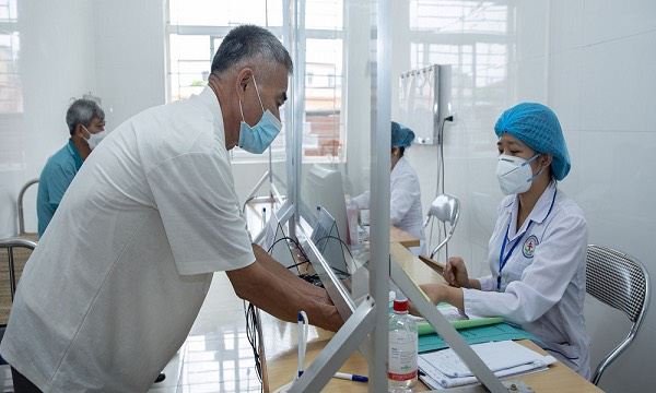 Quy định mới về mức hưởng và thanh toán BHYT khi khám, chữa bệnh ngoại trú- Ảnh 1.