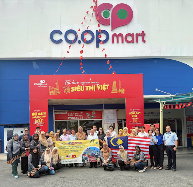 Co.opmart Hoà Bình đón Hợp tác xã Trường học Malaysia đến thăm và làm việc- Ảnh 1.