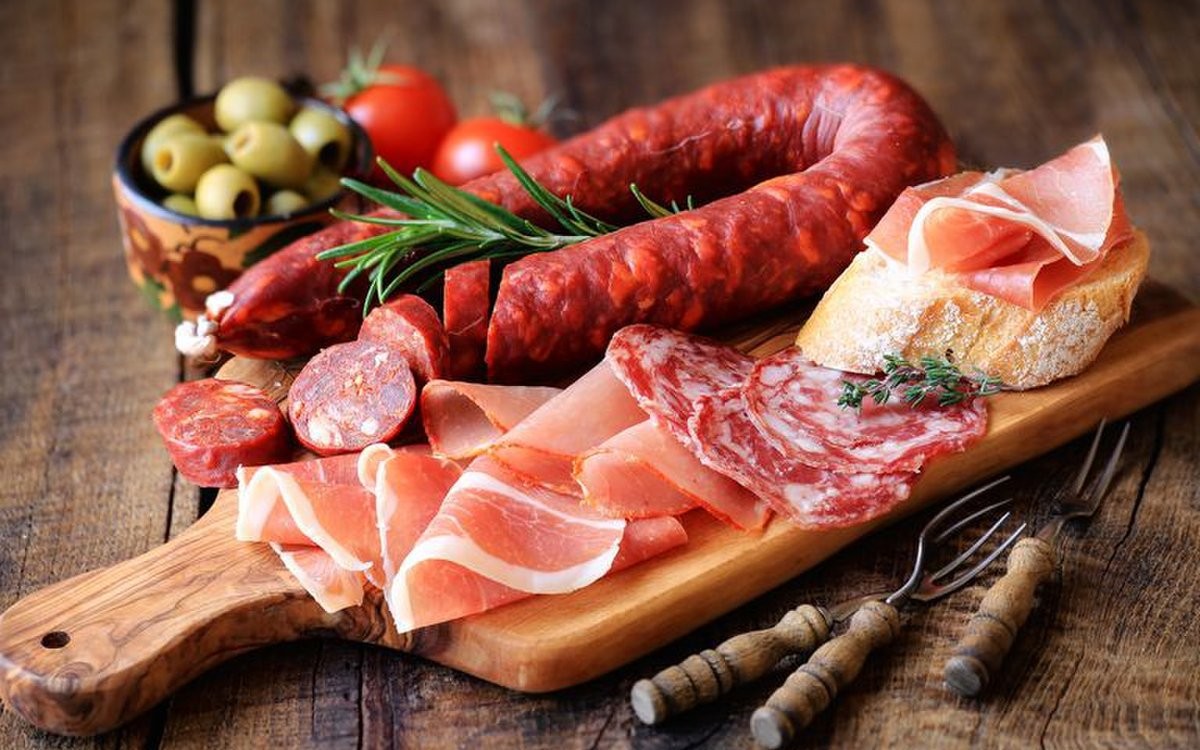 Loại thực phẩm quen thuộc bị WHO cảnh báo gây hại dạ dày, nhiều người vẫn ăn mỗi ngày - Ảnh 1.