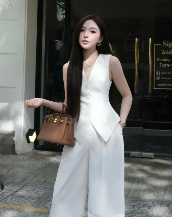 Kh&ocirc;ng cần mua nhiều đồ, chỉ cần một chiếc vest kh&ocirc;ng tay l&agrave; đủ đẹp với 5 c&ocirc;ng thức cực dễ &aacute;p dụng - Ảnh 8.