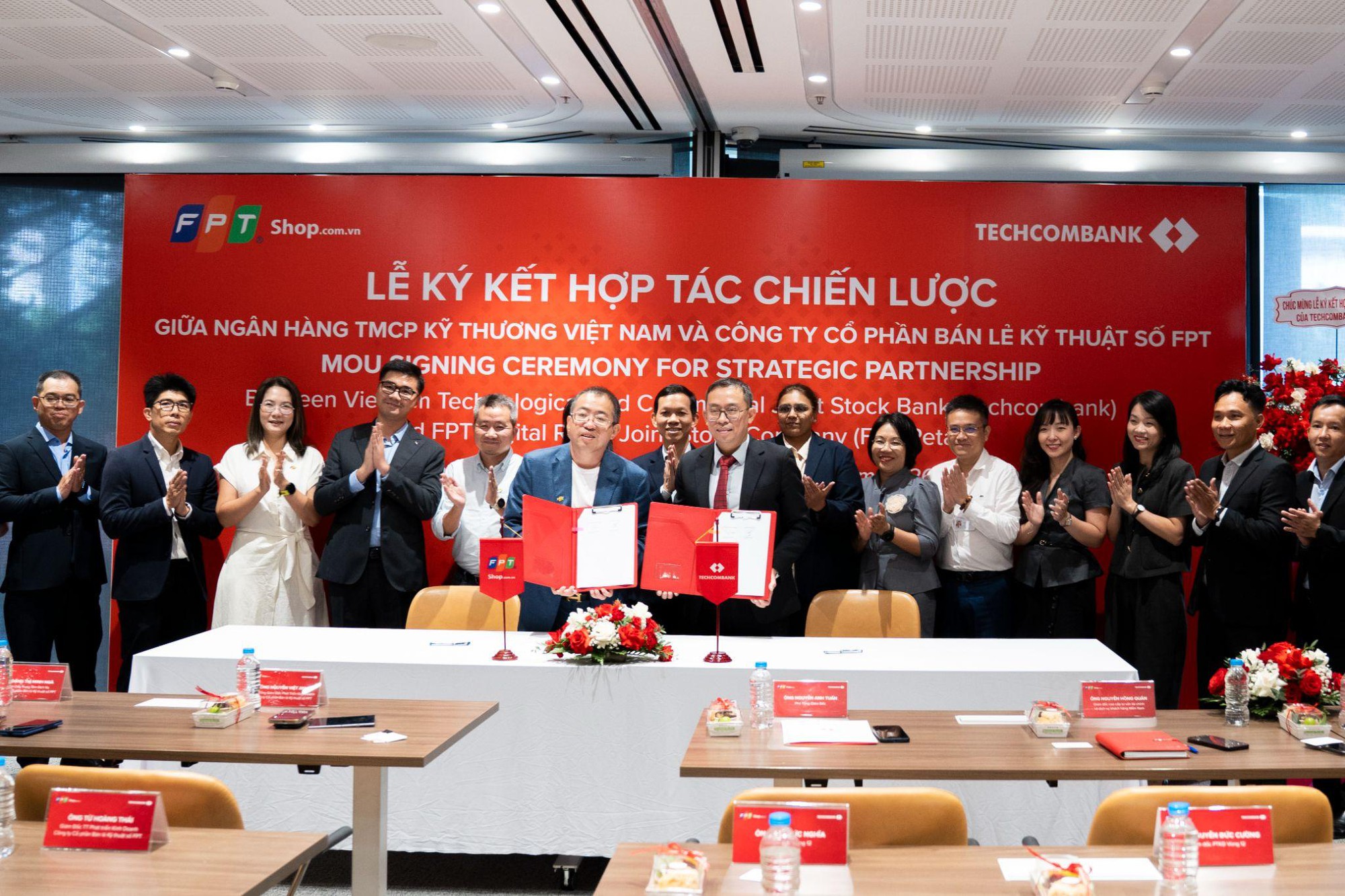 FPT Retail và Techcombank bắt tay phát triển hệ sinh thái tài chính số cho khách hàng mua sắm sản phẩm công nghệ- Ảnh 1.