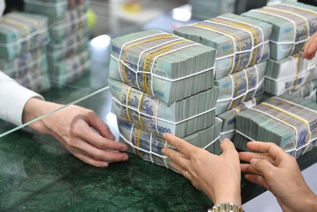 Thủ tướng yêu cầu giảm mặt bằng lãi suất cho vay- Ảnh 1.