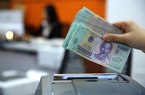 Lại nóng đề xuất đánh thuế thu nhập cá nhân từ lãi tiền gửi tiết kiệm- Ảnh 1.