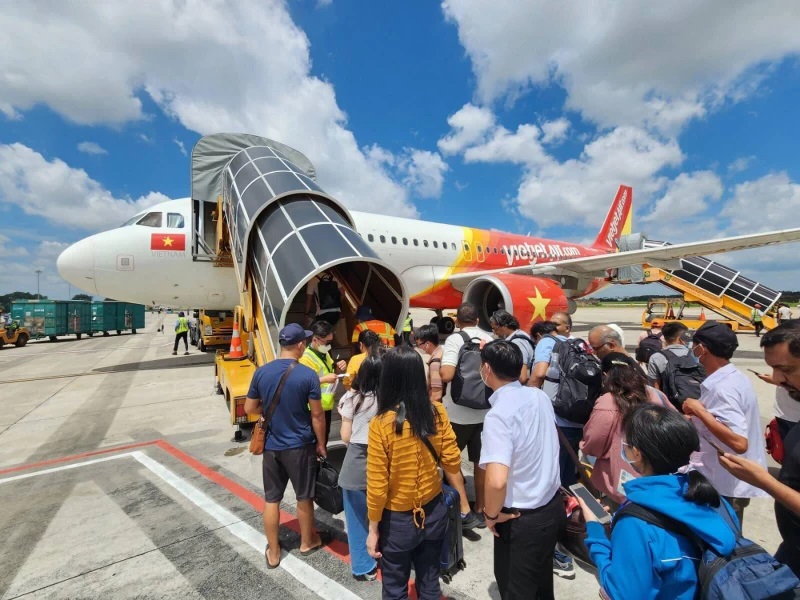 Vietjet Air nhận bàn giao hoạt động phục vụ mặt đất tại cảng hàng không quốc tế Tân Sơn Nhất của SAGS- Ảnh 1.