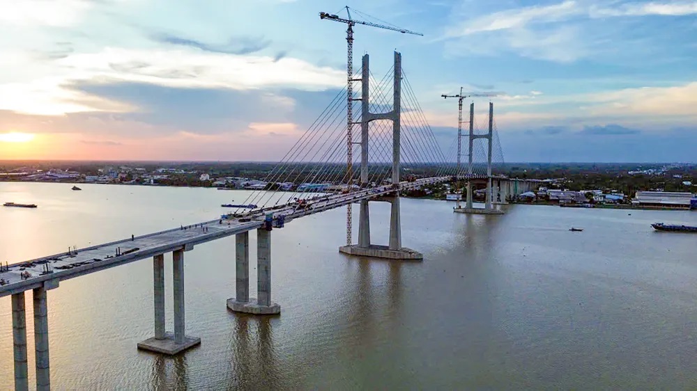 Bất động sản 24h: Cầu Rạch Miễu 2 dự kiến hoàn thành trong tháng 8/2025- Ảnh 1.