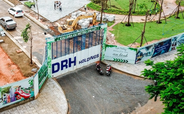 Cổ phiếu chủ đầu tư loạt dự án bất động sản tại TP.HCM đứng trước án hủy niêm yết- Ảnh 1.