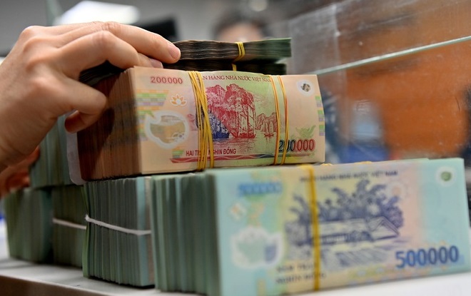Chuyển tiền từ 500 triệu đồng trở l&ecirc;n sẽ phải b&aacute;o c&aacute;o- Ảnh 1.